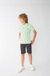 Polo niño Street Monkey Palmeras 255011 Verde Caribe