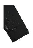 Detalle de manga con gotas de agua del anorak Luhta Iskola negro