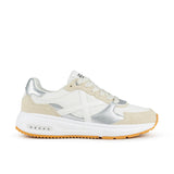 Zapatilla Munich Aurea blanca vista lateral exterior con la X de Munich