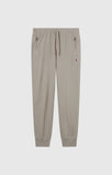 Pantalón hombre Champion con puño y cremallera bolsillos sin felpa 220804 gris - Puber Sports