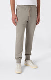 Pantalón hombre Champion con puño y cremallera bolsillos sin felpa 220804 gris - Puber Sports