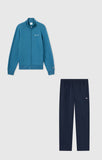 Chándal Champion SWEATSUIT 221786 BS133, chaqueta azul petróleo y pantalón marino vistos por separado
