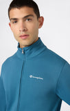 Detalle de la chaqueta azul y pantalón marino del chándal Champion 221786