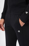 Chándal Champion 222696 negro con chaqueta de capucha y pantalón a juego, vista frontal