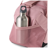 Bolsa PUMA Fundamental XS rosa - Detalle bolsillo lateral de malla con botella