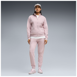 Mujer con el chándal Puma W Twill Standard Suit rosa, vista frontal completa