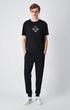 Pantalón hombre Champion SLIM puño y cremallera bolsillos 220807 negro - Puber Sports