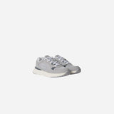 Vista trasera del talón de las zapatillas Champion Rn20 Low grises S33336