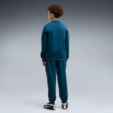 Niño con chándal infantil PUMA ESS Logo Crew JR 689721 azul petróleo, vista trasera