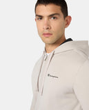 Chándal Champion hombre beige y negro, vista trasera del conjunto