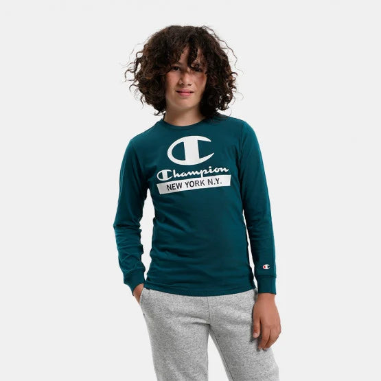 Camiseta nino CHAMPION manga larga 306175F22 GS verde Puber Sports. Tu tienda de deportes y moda deportiva