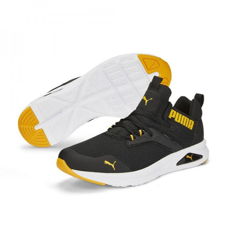 Puma media bota en negro y amarillo